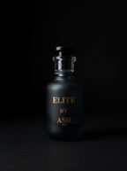 Elite by ASH perfume against a dark background